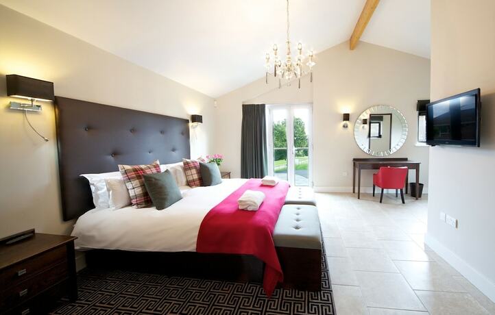 Imagen de la habitación del Hotel Apple Tree Lodges. Foto 15