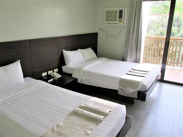 Imagen de la habitación del Hotel Apple Tree Resort and Hotel. Foto 3