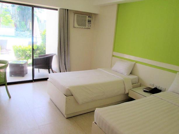 Imagen de la habitación del Hotel Apple Tree Resort and Hotel. Foto 8