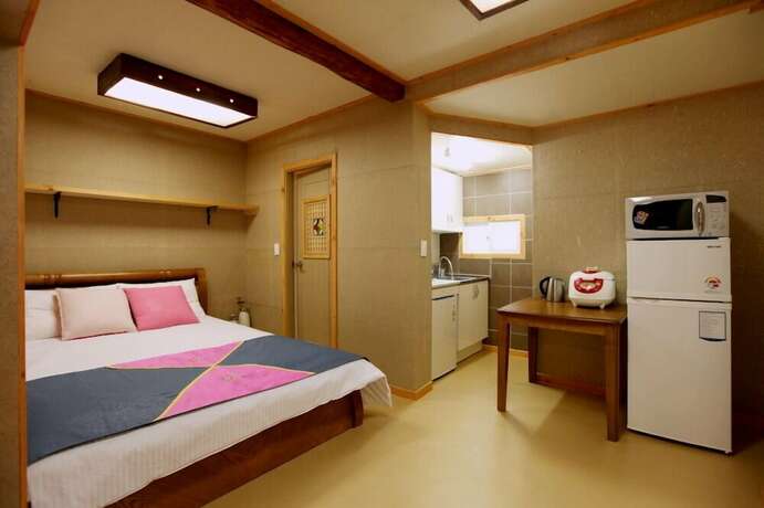 Imagen de la habitación del Hotel Apple farm stay. Foto 12