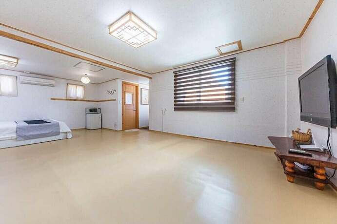 Imagen de la habitación del Hotel Apple farm stay. Foto 18