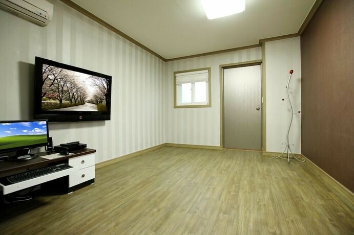 Imagen de la habitación del Hotel Apple farm stay. Foto 19