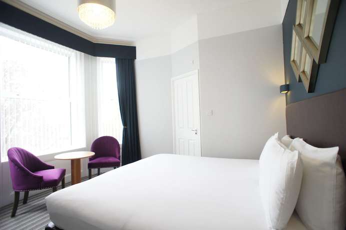 Imagen de la habitación del Hotel Applewood. Foto 16