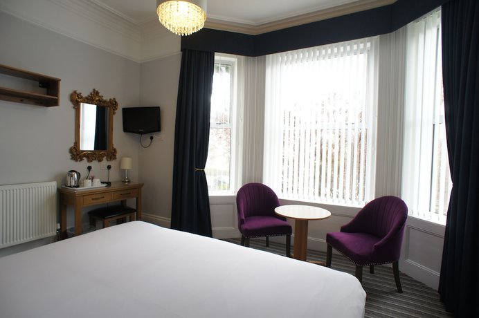 Imagen de la habitación del Hotel Applewood. Foto 19