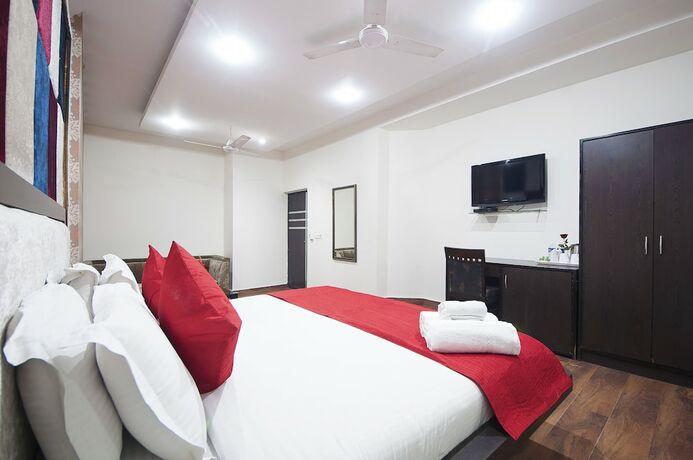 Imagen de la habitación del Hotel Apra International. Foto 16