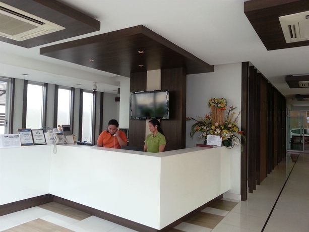 Imagen de los interiores del Hotel April Suites. Foto 4