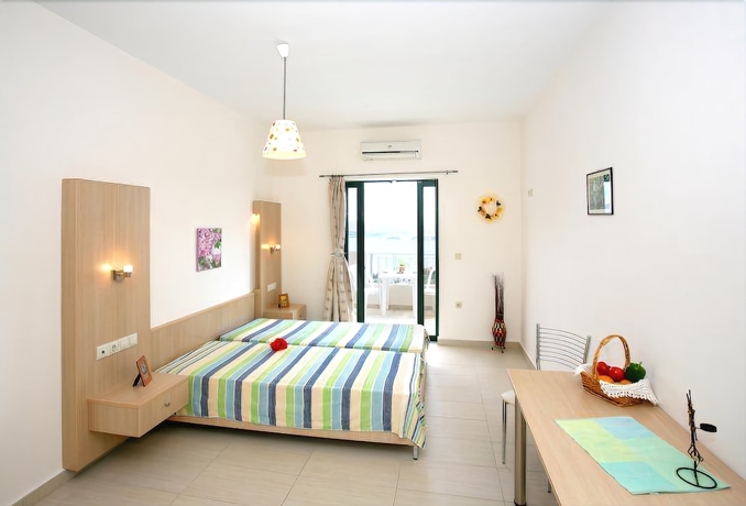 Imagen de la habitación del Hotel Aptera Paradise. Foto 7