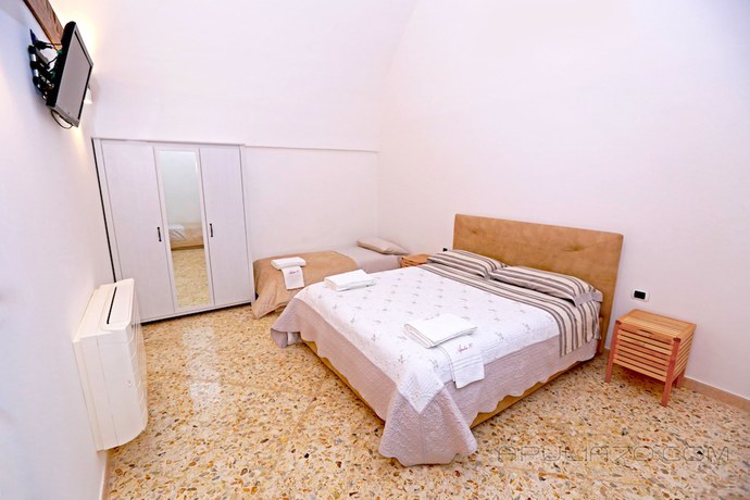 Imagen de la habitación del Hotel Apulia 70 Holidays. Foto 4