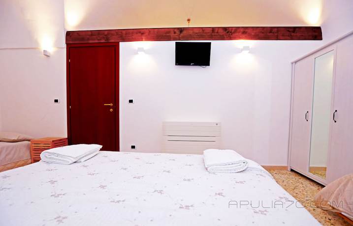 Imagen de la habitación del Hotel Apulia 70 Holidays. Foto 8