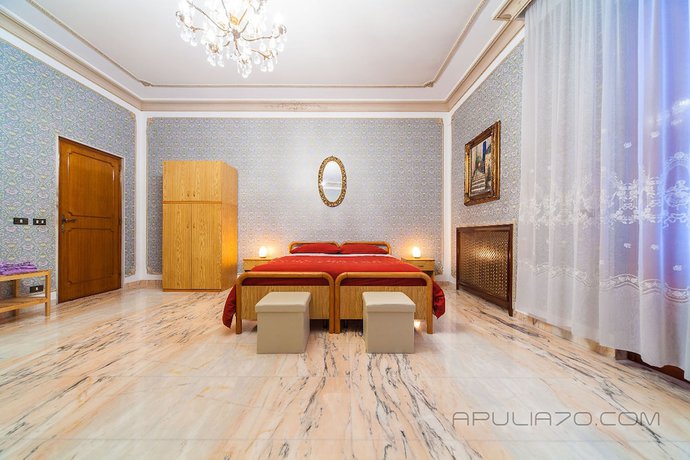 Imagen de la habitación del Hotel Apulia 70 Holidays. Foto 11