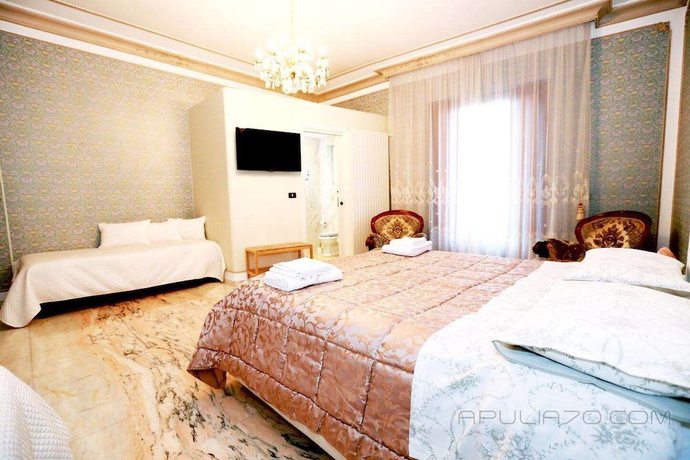 Imagen de la habitación del Hotel Apulia 70 Holidays. Foto 12