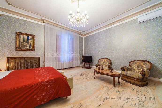 Imagen de la habitación del Hotel Apulia 70 Holidays. Foto 13