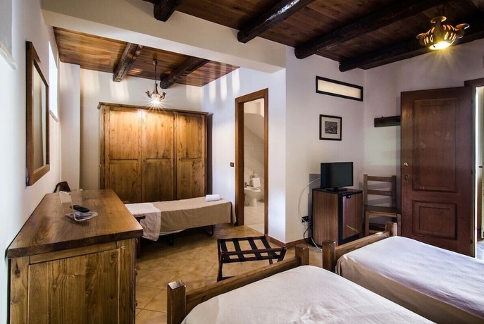 Imagen de la habitación del Hotel Apulia Borgo Torre Artale. Foto 18