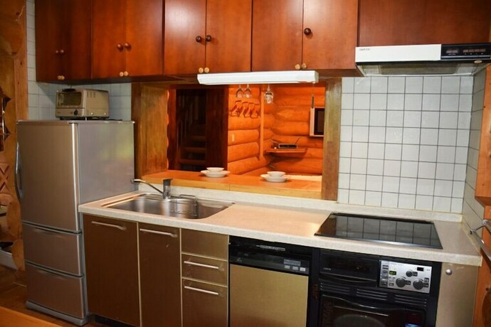 Imagen de la habitación del Hotel Aqua Alpine Cottage. Foto 19