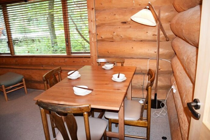 Imagen de la habitación del Hotel Aqua Alpine Cottage. Foto 26