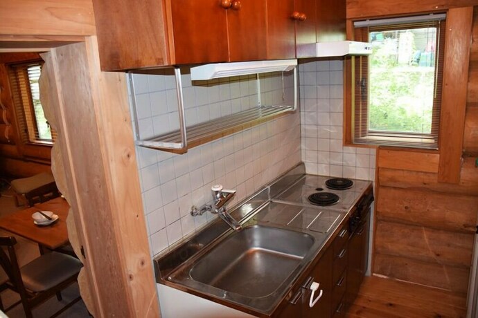 Imagen de la habitación del Hotel Aqua Alpine Cottage. Foto 28