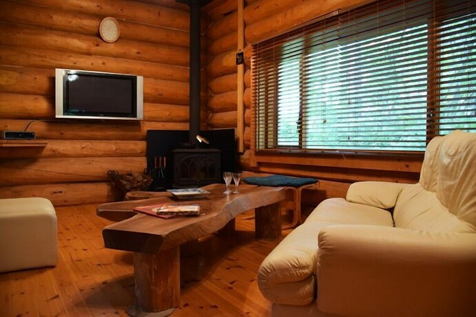 Imagen de la habitación del Hotel Aqua Alpine Cottage. Foto 32