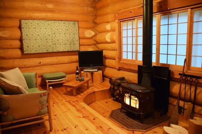 Imagen de la habitación del Hotel Aqua Alpine Cottage. Foto 36