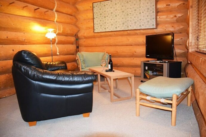 Imagen de la habitación del Hotel Aqua Alpine Cottage. Foto 38