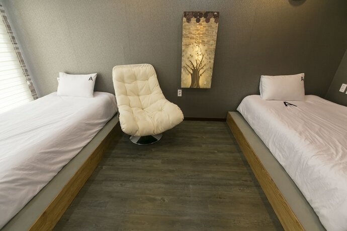 Imagen de la habitación del Hotel Aqua Beautique. Foto 21