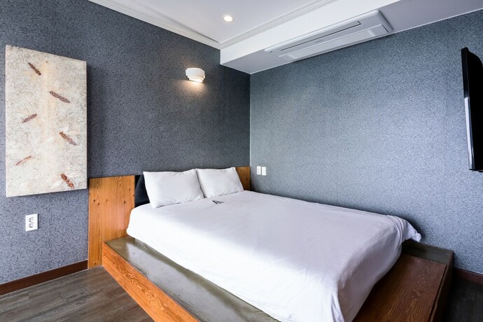 Imagen de la habitación del Hotel Aqua Beautique. Foto 29