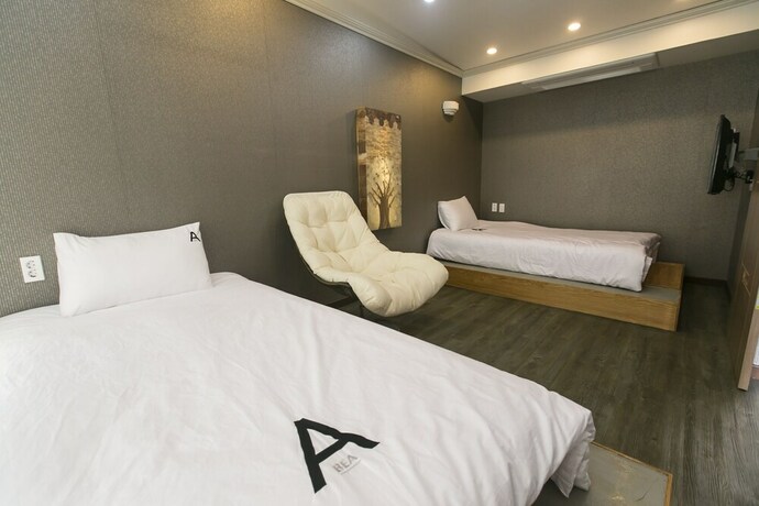 Imagen de la habitación del Hotel Aqua Beautique. Foto 33