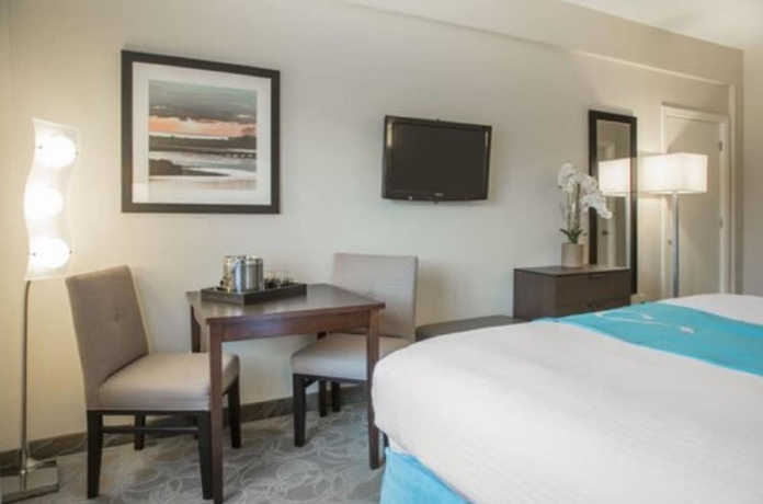 Imagen de la habitación del Hotel Aqua Blue and Conference Center. Foto 7