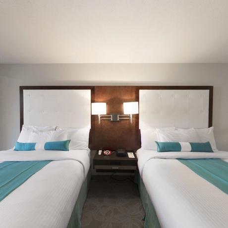 Imagen de la habitación del Hotel Aqua Blue and Conference Center. Foto 12