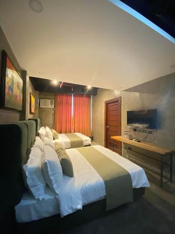 Imagen de la habitación del Hotel Aqua Frontier and Restaurant. Foto 11