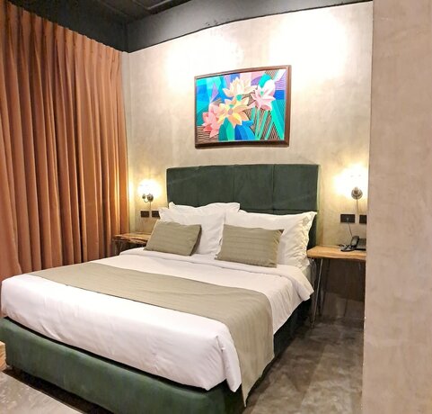 Imagen de la habitación del Hotel Aqua Frontier and Restaurant. Foto 17