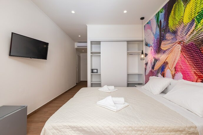 Imagen de la habitación del Hotel Aqua Luxury Suites Roda. Foto 15