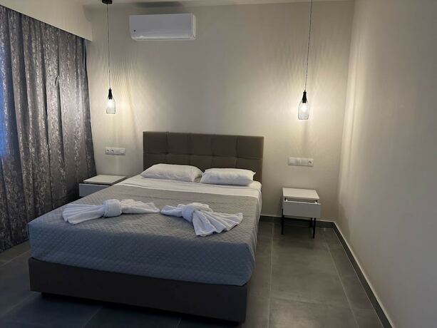 Imagen de la habitación del Hotel Aqua Luxury Suites Roda. Foto 16