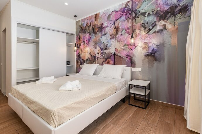 Imagen de la habitación del Hotel Aqua Luxury Suites Roda. Foto 18