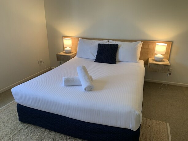 Imagen de la habitación del Hotel Aqua Promenade Beachfront Apartments. Foto 30