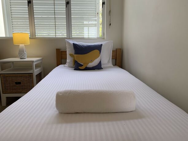 Imagen de la habitación del Hotel Aqua Promenade Beachfront Apartments. Foto 37