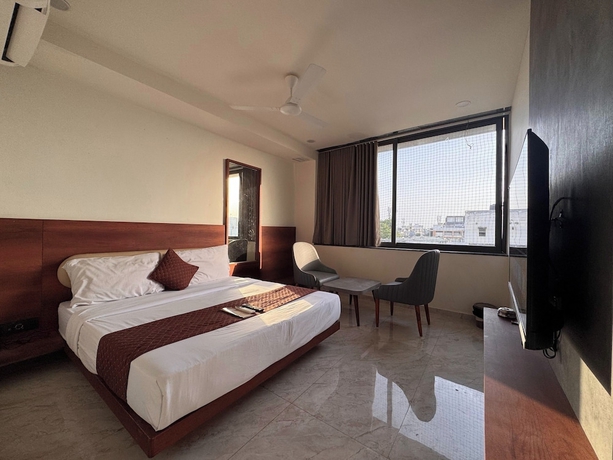 Imagen de la habitación del Hotel Aqua Rajkot. Foto 4
