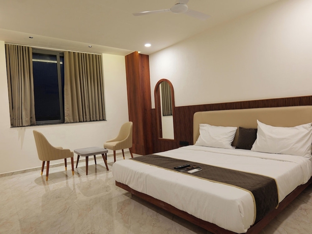Imagen de la habitación del Hotel Aqua Rajkot. Foto 7