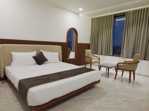 Imagen de la habitación del Hotel Aqua Rajkot. Foto 9