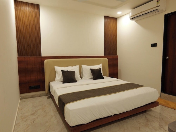 Imagen de la habitación del Hotel Aqua Rajkot. Foto 10