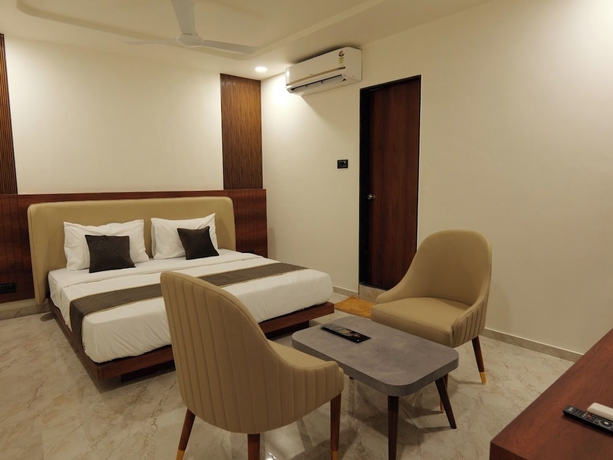 Imagen de la habitación del Hotel Aqua Rajkot. Foto 11