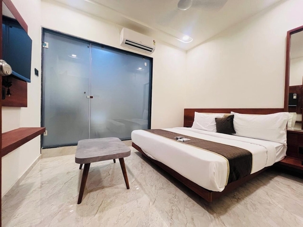 Imagen de la habitación del Hotel Aqua Rajkot. Foto 14