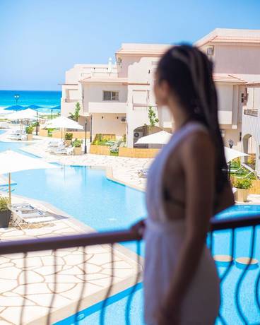 Imagen de la piscina del Hotel Aqua Sidi Heneish by Alma. Foto 16