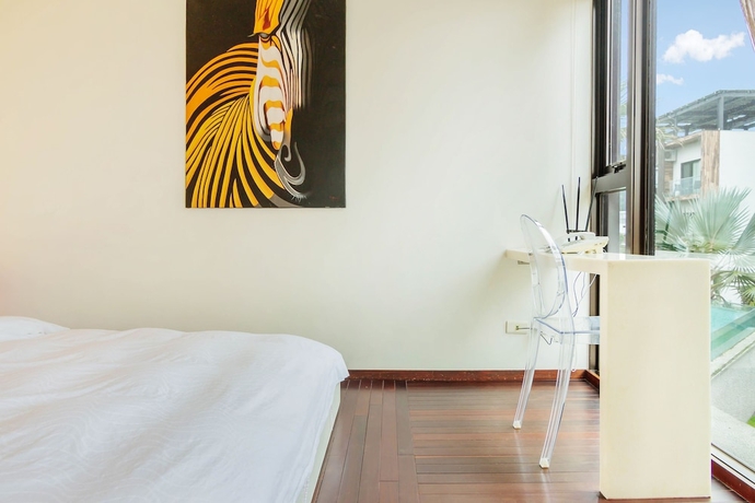 Imagen de la habitación del Hotel Aqua Star Villa. Foto 12