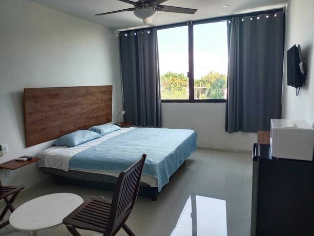 Imagen de la habitación del Hotel Aqua Vista by La Cultura Suites. Foto 15