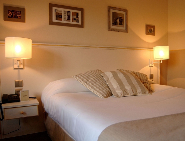 Imagen de la habitación del Hotel Aquabella and Spa. Foto 9