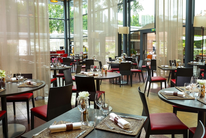 Imagen del bar/restaurante del Hotel Aquabella and Spa. Foto 6