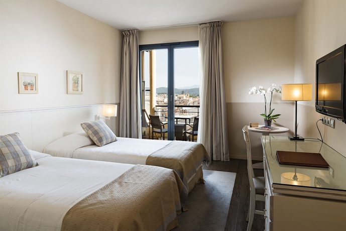 Imagen de la habitación del Hotel Aquabella and Spa. Foto 12