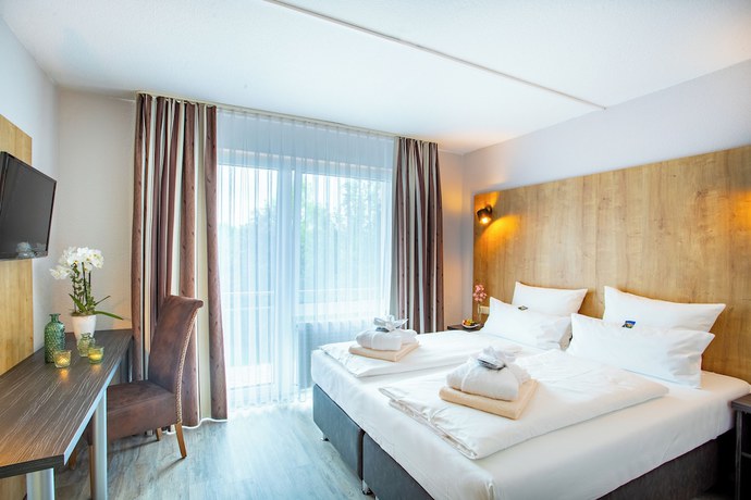Imagen de la habitación del Hotel Aqualux Wellness And Tagungshotel. Foto 11