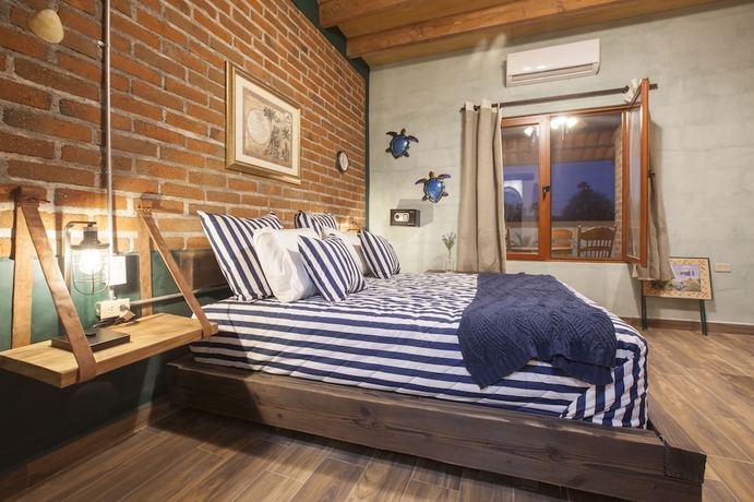 Imagen de la habitación del Hotel Aquamarina Boutique. Foto 6