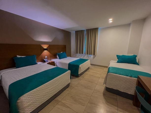 Imagen de la habitación del Hotel Aquamarina Manta. Foto 10